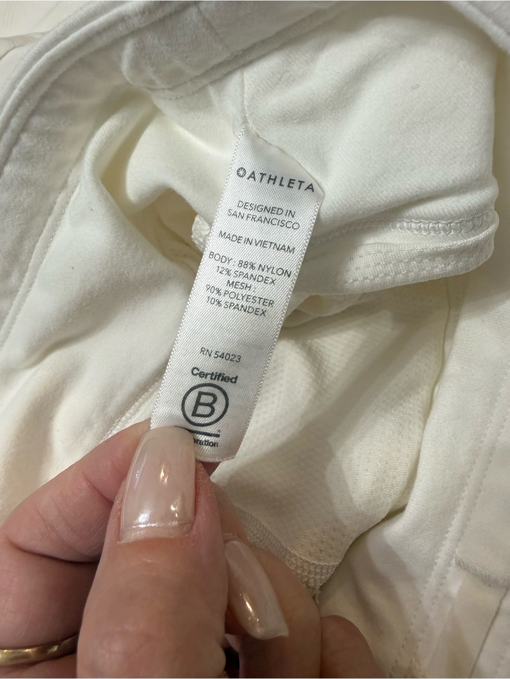 Athleta Cream High-Rise Mini Skort with Side Accent Buttons size xs - Picture 9 of 9
